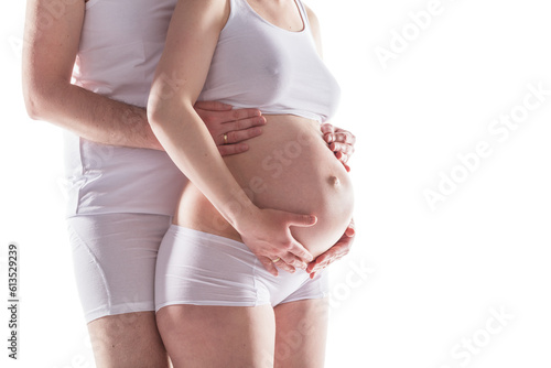 Couple expecting a baby and touching pregnant woman's belly. Isolated on transparent white background