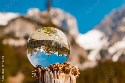 Crystal ball alpine landscape shot at the Wochenbrunner Alm, Ellmau, Mount Wilder Kaiser, Tyrol, Austria