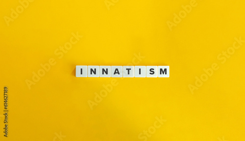 Innatism Term on Letter Tiles on Yellow Background. Minimal Aesthetic.