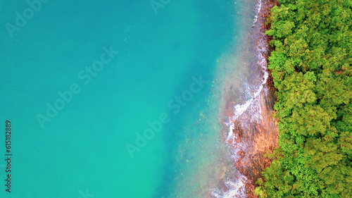 Top view of beautiful sand beach with turquoise sea water,Wave propagation, Aerial view from drone camera, Summer concept.