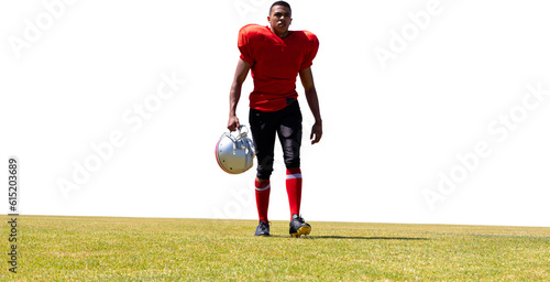 Digital png photo of african american rugby player walking on sport field on transparent background
