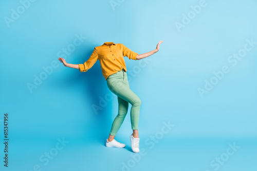 Creative abstract composite photo template collage of unusual weird headless woman dancing enjoy music isolated on blue color background