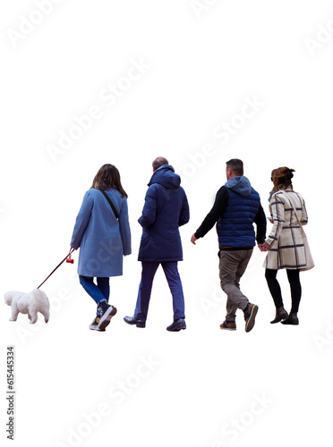Groupe de quatre jeunes personnes se promenant avec un chien. 