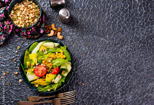 salad with avocado, nuts and sweet corn