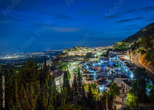 Mijas village in Andalusia with white houses, Spain at night