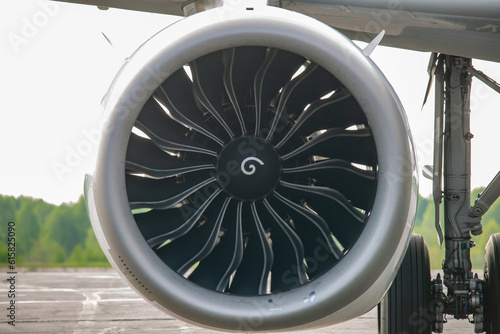 Close up view of a turboprop engine of an airplane.