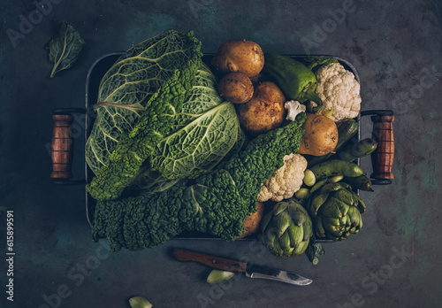 Fresh organic raw vegetables savoy cabbage, cauliflower, potatoes, artichokes and broad beans. Bio Healthy food