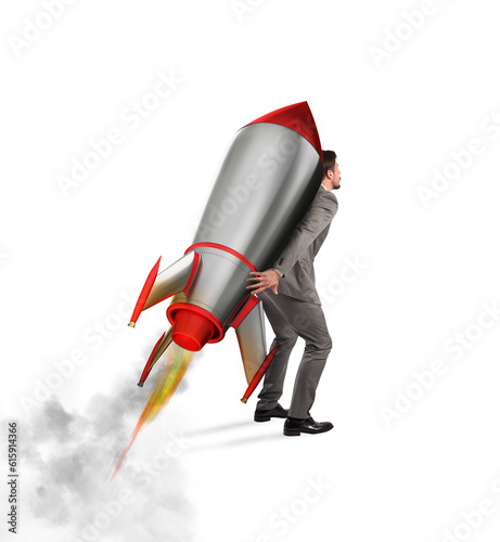 Businessman holding a missile on his shoulders, isolated on white background