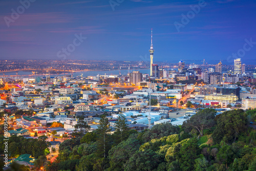 Cityscape image of Auckland skyline, New Zealand taken from Mt. Eden at dusk.