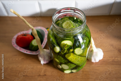 Ogórki zielone kiszone małosolne słoik. Pickled green cucumbers in a jar