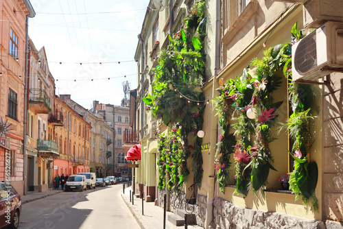 Historical vintage house decorated by flowers in downtown of Lviv, Ukraine 