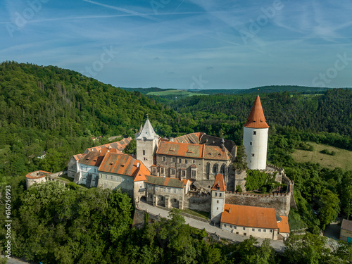 Aerial view of triangular shape restored Gothic medieval castle Krivoklat in Central Bohemia Czech Republic with concentric keep