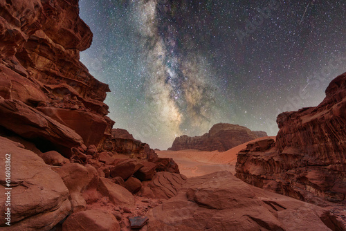 Majestic view of the Wadi Rum desert, Jordan, The Valley of the Moon. Orange sand, Milky Way sky.