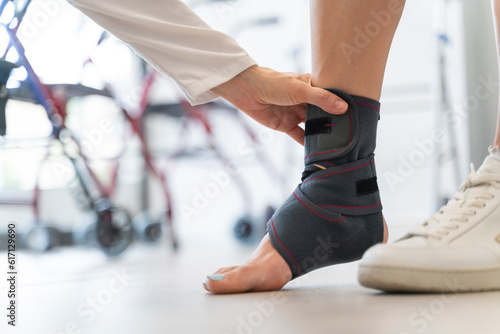 Close-up of a woman's foot with a sports ankle brace