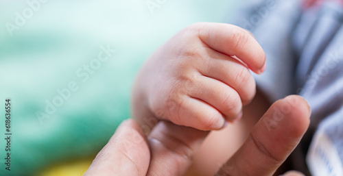 Baby hand,Newborn baby hand in mother hand, mother and her baby, happy family concept, beautiful conception image of childbirth. 