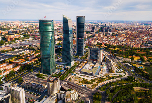 Aerial cityscape of Madrid with four modern business skyscrapers Cuatro Torres