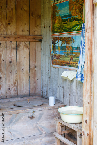 Interior of an old outhouse in the country