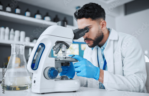 Microscope, science and research with man in laboratory for pharmacy, medical and vaccine. Chemistry, healthcare and medicine with scientist and study for solution, development and sample results