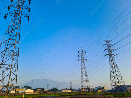 Extra high voltage air channels under clear blue background