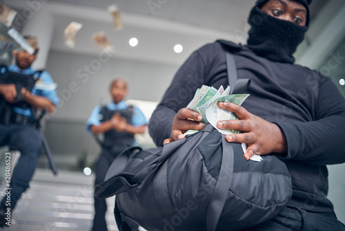 Bank, robbery and police running after criminal for justice, punishment and safety, serious and danger. Crime, corruption and man robber with stolen money running for security, law or financial loss