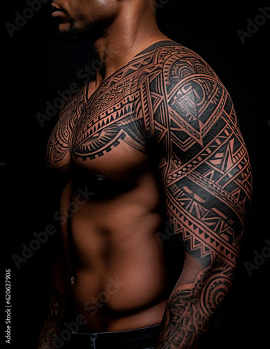 Muscular man with tribal tattoos on on his arm and chest against black background. Generative Ai image