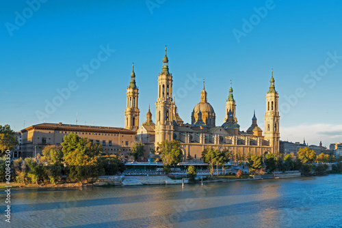 The ancient church Basilica del Pillar and bridge near the river Ebro in the Spanish city Zaragoza