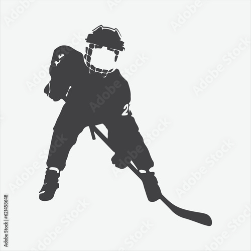 Energetic Action, Silhouettes of a Young Boy in Ice Hockey Gear Displaying Skills and Passion Against a Dynamic Background