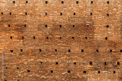 Panoramic background of wide old red brick wall texture. Home or office design backdrop