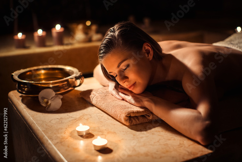 Sleeping woman in beauty spa