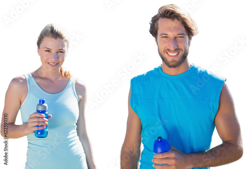 Digital png photo of caucasian sports couple with bottles of water on transparent background