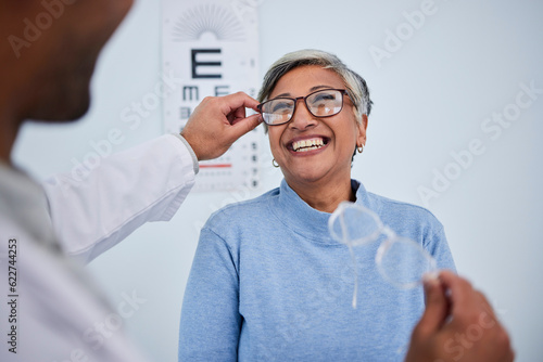 Glasses, doctor or happy old woman in eye test assessment for healthcare, wellness or vision examination. Smile, visual or mature client testing a optician or optometrist in optometry consultation