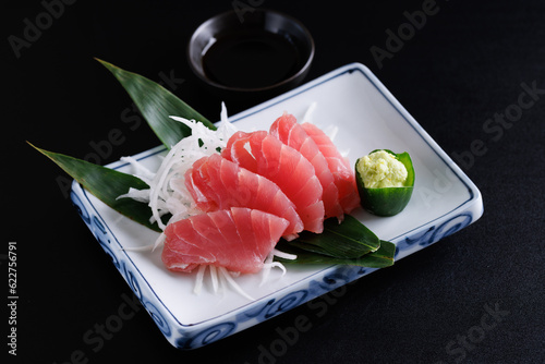 Tuna sashimi isolated in black background