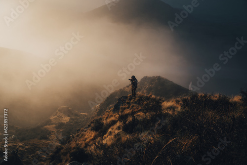 Man hunting for deer in hills