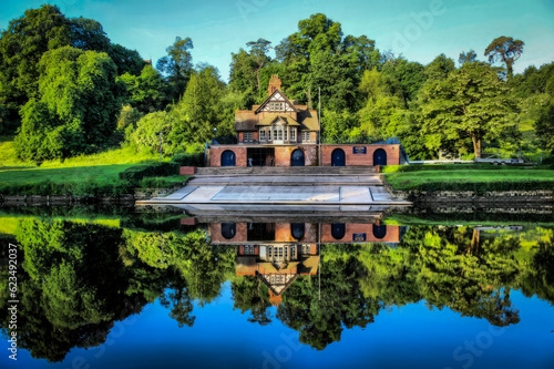 View of a boathouse across a lake