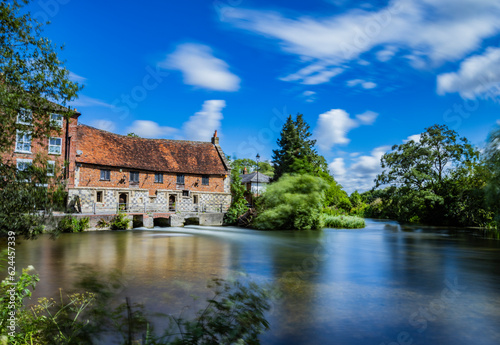 Old Mill and river with countryside, United Kingdom