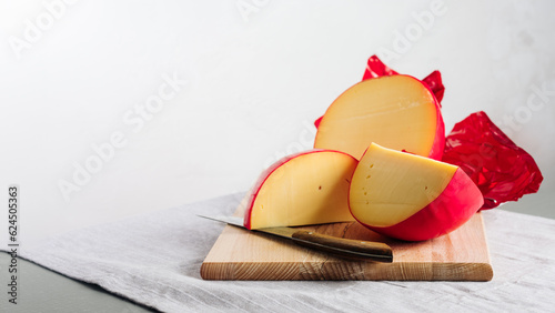 Sliced head of Edam cheese.