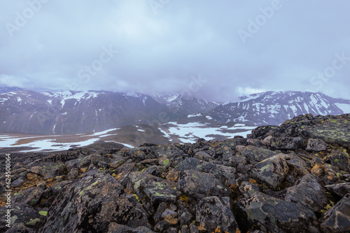 Galdhopiggen, Norway - July 3rd, 2023: The mountain landscape on the hike to the peak of Galdhopiggen In Jotunheimen National Park, Norway