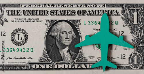 The symbolic figure of an airplane on a bill of denomination of 1 US dollar