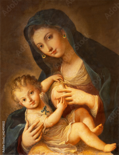NAPLES, ITALY - APRIL 20, 2023: The painting of Nursing Madonna in the church Chiesa di Santa Caterina a Chiaia by Antonio Sarnelli (1742 - 1793)