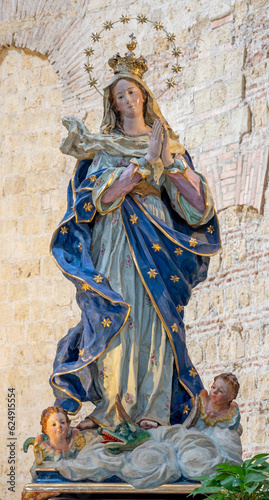 NAPLES, ITALY - APRIL 22, 2023: The carved polychrome statue of Immaculate Conception in the church Basilica di San Giovanni Maggiore by unkonwn artist from year 1630. 