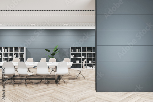 Front view of blank grey wall with empty place for poster or frame and modern negotiant office room on a background, mockup. 3D Rendering
