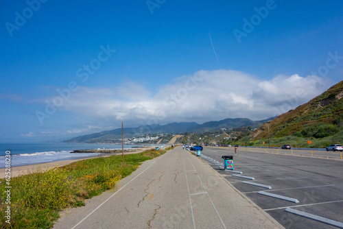 Views of Will Rogers Beach and the Santa Monica Mountains while biking down the Marvin Braude Bike Trail along the California coast