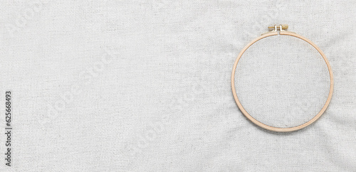 Wooden embroidery hoop with canvas. Banner for design
