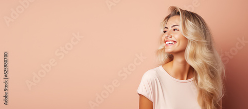 Smiling young woman with blonde long groomed hair isolated on pastel flat background with copy space. Blonde hair care products banner template, hair salon.