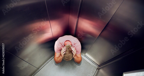 Man Suffering From Claustrophobia Trapped Inside Elevator