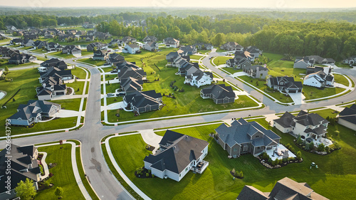 Rich expensive neighborhood aerial with mini mansions, high-end, million-dollar homes