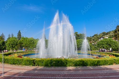 Loznica, Serbia - July 12, 2022: Medical wellness center Banja Koviljaca, Serbia. Beautiful fountain in center of Banja Koviljaca.