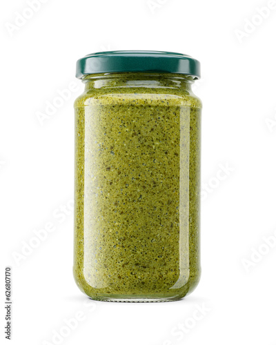 Green Italian sauce pesto in glass jar with metal twist off lid isolated. Transparent PNG image.