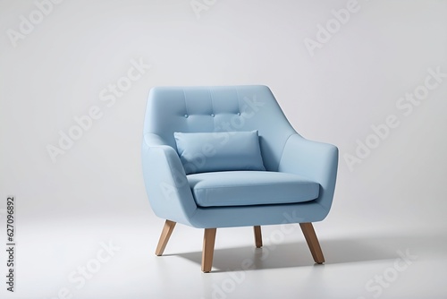 un moderno sillón azul en una habitación blanca