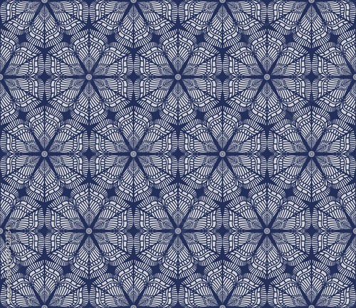 Vector seamless geometrical pattern. Silver grey frosty flowers, snowflakes, stars from feathers on a dark indigo blue background